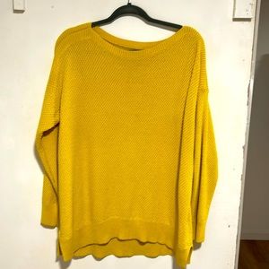Bright yellow knit sweater